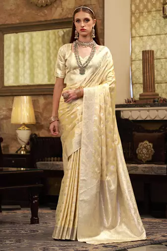 cream soft satin art silk silver weaving traditional wear saree