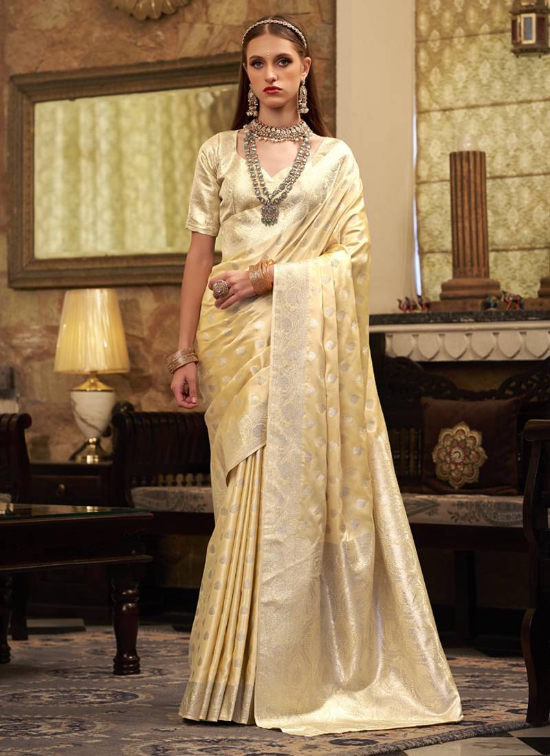 cream soft satin art silk silver weaving traditional wear saree