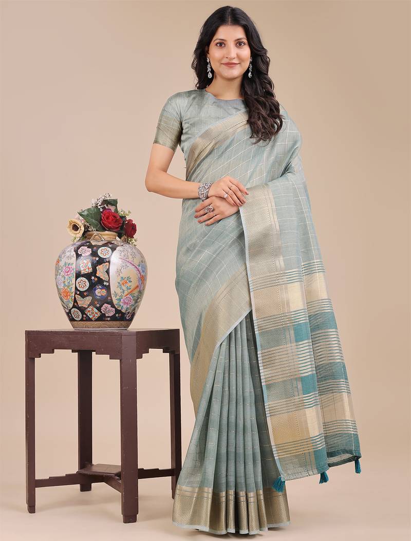 sea green color solid orgenza zari border  saree 