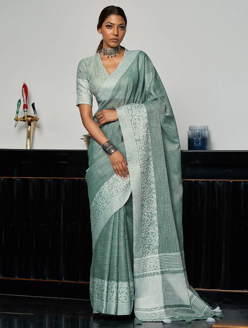 sea green color solid zari border linen cotton saree