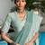 sea green color solid zari border linen cotton saree