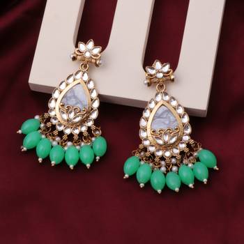 Kundan type zumka earring for girls 1