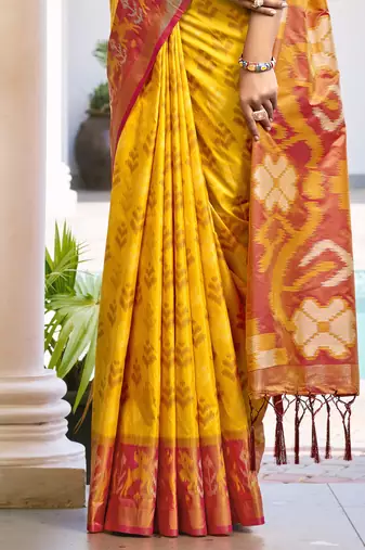 Yellow & orange pochampalli soft silk blend saree with traditional ikat pallu saree