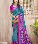 Sea green pochampalli soft silk blend saree with traditional ikat woven pallu