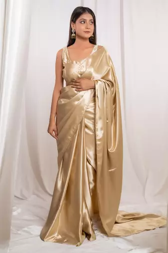 Golden cutdana border satin embroidered saree with stitched blouse