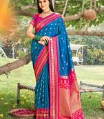 Graceful blue banarasi silk blend saree with golden zari woven border & floral jaal – wedding & festive wear