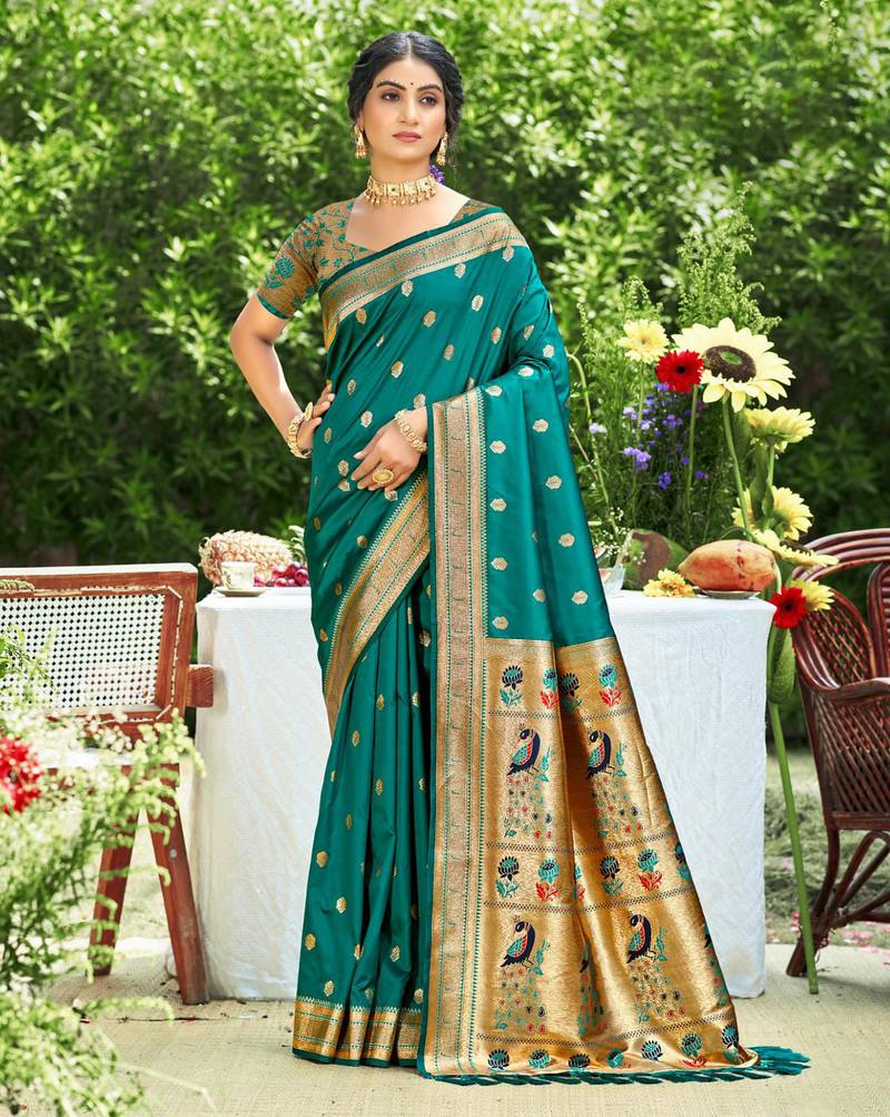 Graceful teal banarasi silk blend saree with golden zari woven border & floral jaal – wedding & festive wear