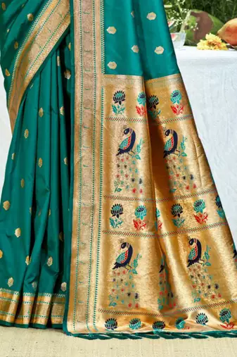 teal banarasi silk blend saree with golden zari woven border