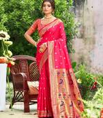 Graceful pink banarasi silk blend saree with golden zari woven border & floral jaal     wedding & festive wear