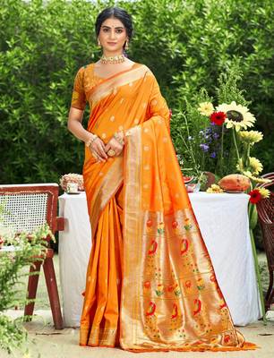 orange banarasi silk blend saree with golden zari woven border 1