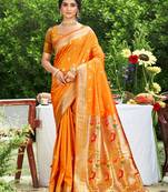 Graceful orange banarasi silk blend saree with golden zari woven border & floral jaal     wedding & festive wear