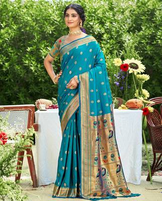 yellow banarasi silk blend saree with golden zari woven border 1