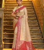 Ivory and pink banarasi silk blend saree with golden zari – regal elegance for timeless celebrations