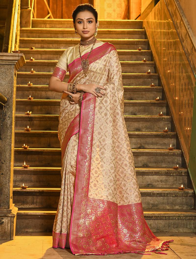 Ivory and pink banarasi silk blend saree with golden zari – regal elegance for timeless celebrations
