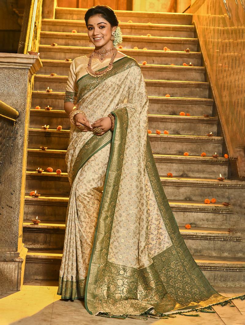 Ivory and green banarasi silk blend saree with golden zari – regal elegance for timeless celebrations
