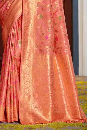 Graceful peach banarasi silk blend saree with golden zari woven border & floral jaal     wedding & festive wear