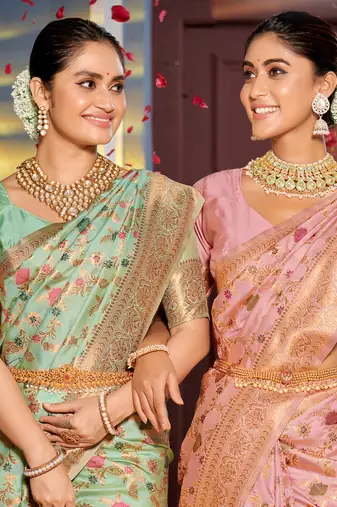 Graceful sea green banarasi silk blend saree with golden zari woven border & floral jaal     wedding & festive wear