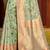 Graceful sea green banarasi silk blend saree with golden zari woven border & floral jaal     wedding & festive wear