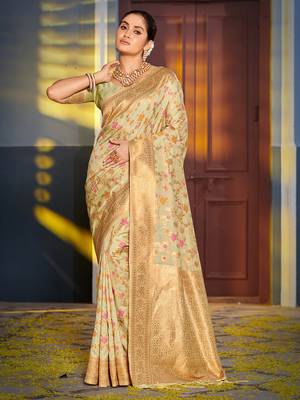 light green banarasi silk blend saree with golden zari woven border 1