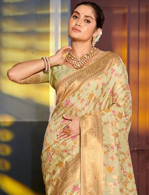 light green banarasi silk blend saree with golden zari woven border 2