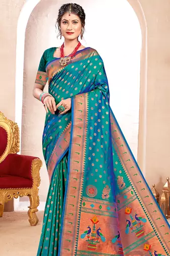 Sea green kanjivaram silk blend saree with golden zari and colorful peacock woven pallu design