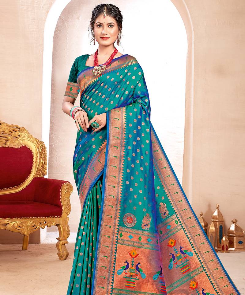 Sea green kanjivaram silk blend saree with golden zari and colorful peacock woven pallu design
