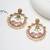 Abhika creations gold-toned peacock chandbali earrings with pink stones & pearl drops