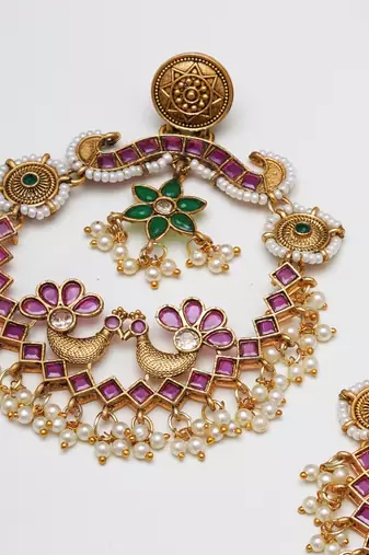 Abhika creations gold-toned peacock chandbali earrings with pink stones & pearl drops