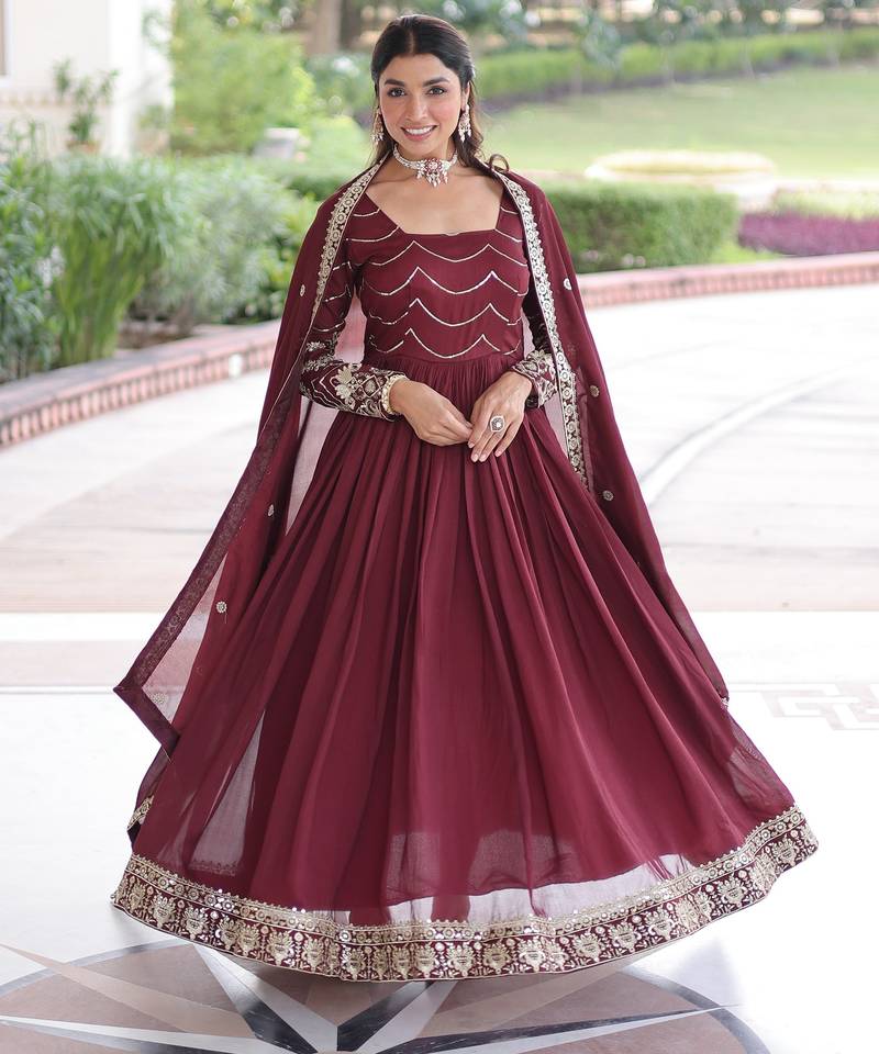 Maroon color vichitra silk fabric glamorous ceremonial gown for wedding looks