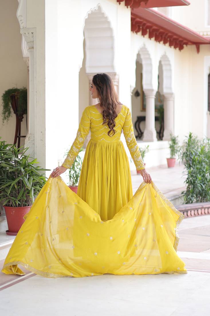 Yellow color vichitra silk fabric glamorous ceremonial gown for wedding looks
