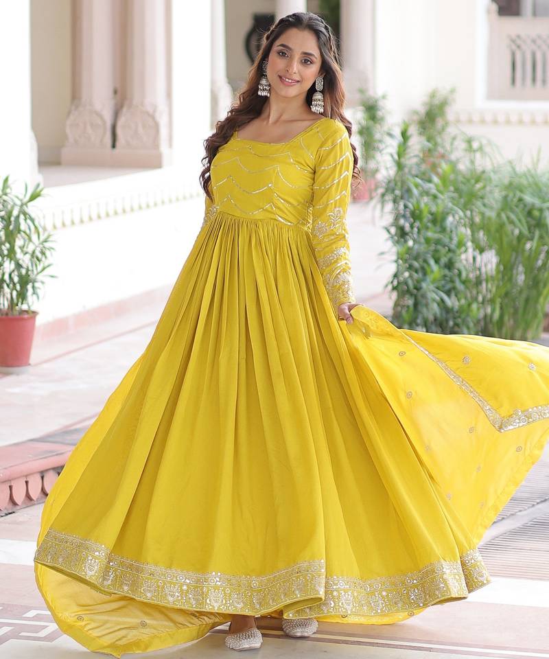 Yellow color vichitra silk fabric glamorous ceremonial gown for wedding looks
