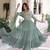 Green color faux georgette fabric glamorous ceremonial gown for wedding looks
