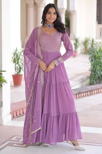Purple color sophisticated rich party looks gown with dupatta