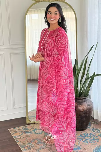 Pink color rayon party looks salwar kameez for girls