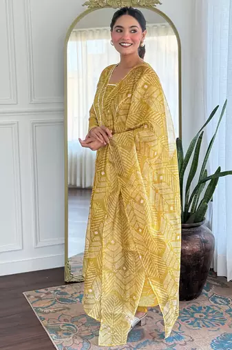 Yellow color rayon party looks salwar kameez for girls