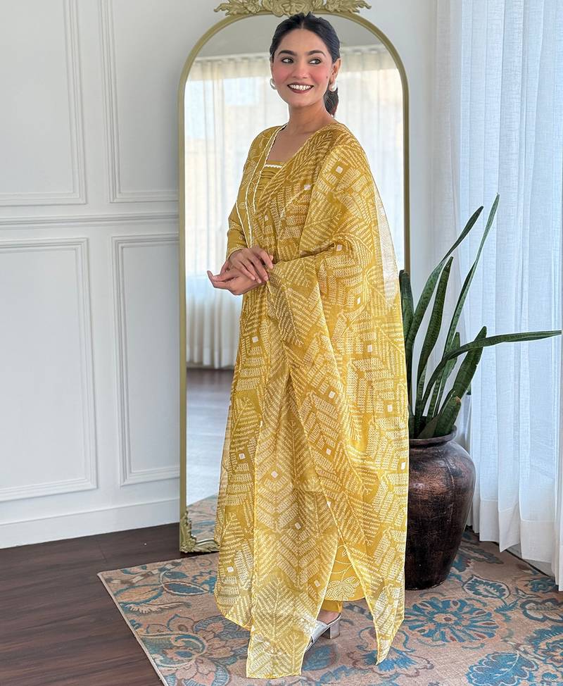 Yellow color ethnic rayon fabric party looks salwar kameez for girls