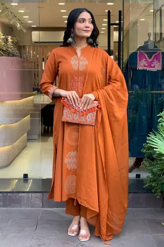 Orange color chanderi party looks salwar kameez for girls