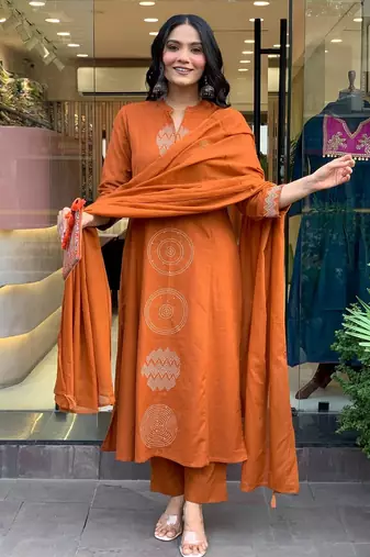 Orange color chanderi party looks salwar kameez for girls