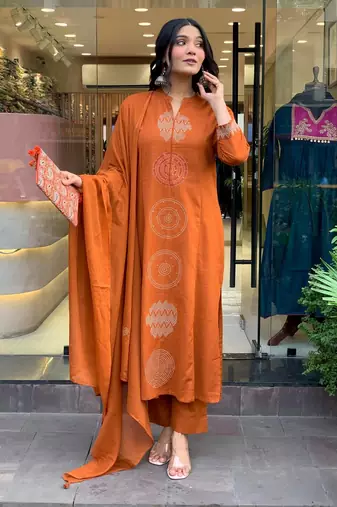 Orange color chanderi party looks salwar kameez for girls