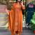 Orange color ethnic chanderi fabric party looks salwar kameez for girls