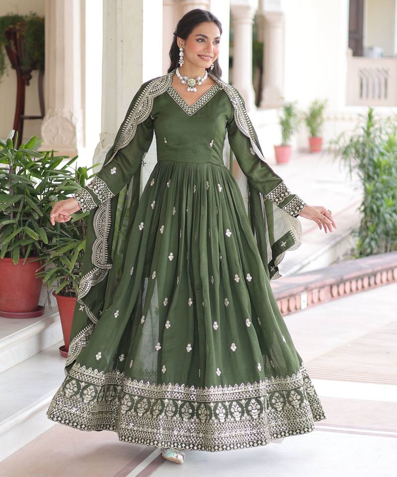 Green color vichitra silk fabric wedding ceremonial gown with dupatta for girlie looks