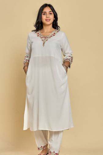 White color zari with thread work kurta with pant