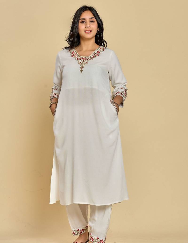 White color zari with thread work kurta with pant