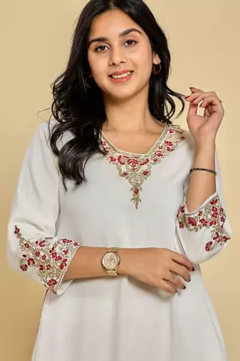 White color zari with thread work kurta with pant