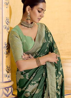 dark green faux crepe silk blend zari weaving work saree 2