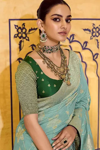 sea green faux crepe silk blend zari weaving work saree