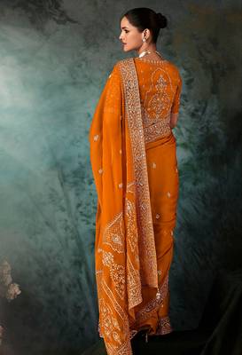 Orange fancy fabric embroidered saree 3