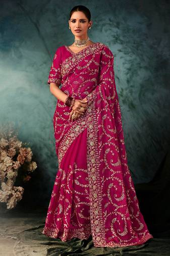 Rani pink faux crepe embroidery bridal reception festival wedding wear heavy border saree