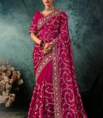 Rani pink faux crepe embroidery bridal reception festival wedding wear heavy border saree