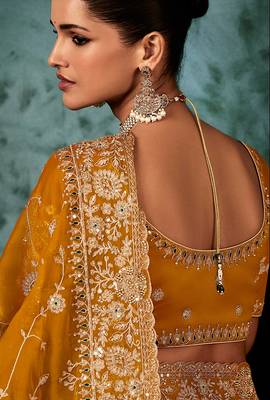 Orange fancy fabric embroidered saree 4